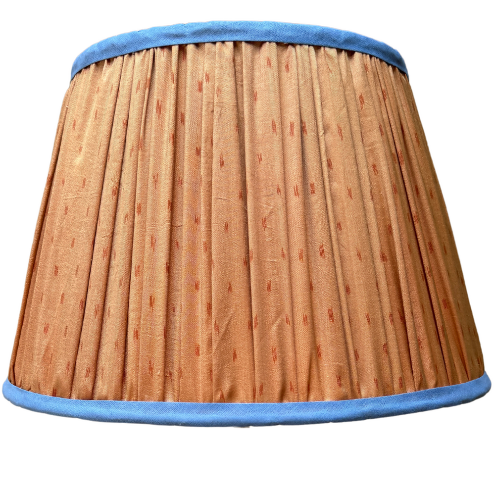 
                      
                        36cm Orange Silk Sari Lampshade with Blue Trim
                      
                    