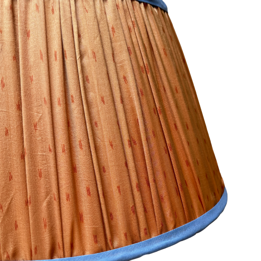 
                      
                        36cm Orange Silk Sari Lampshade with Blue Trim
                      
                    